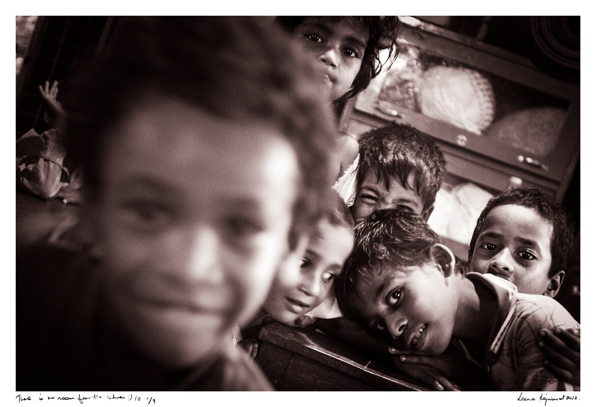 In the heart of the red light district, children laughed and smiled, radiating joy in the face of adversity