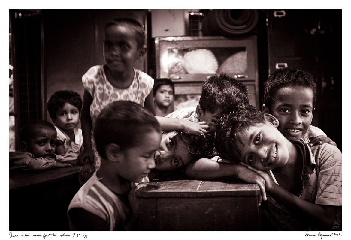 Children laughing at the camera, showing their ability to smile despite all odds