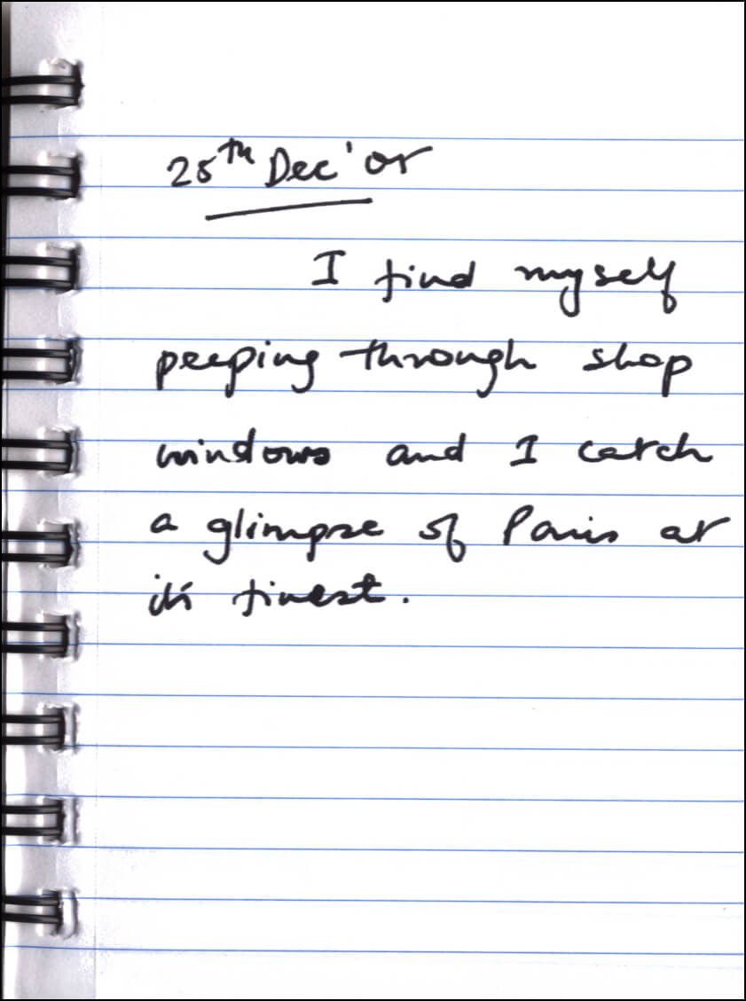 A handwritten journal entry dated December 28, 2001, reflecting on observing Paris through shop windows and its beauty
